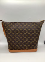 LOUIS VUITTON Excellent: This item is gently used Handbag
