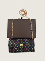LOUIS VUITTON Excellent: This item is gently used Wallet
