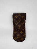LOUIS VUITTON Excellent: This item is gently used Pouch