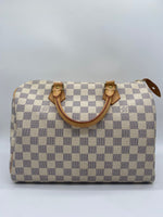 LOUIS VUITTON Excellent: This item is gently used Handbag