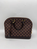 LOUIS VUITTON Excellent: This item is gently used Handbag
