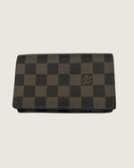 LOUIS VUITTON Excellent: This item is gently used Wallet