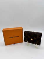 LOUIS VUITTON Like New / NWOT: Item is pristine Wallet