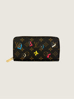 LOUIS VUITTON Excellent: This item is gently used Wallet