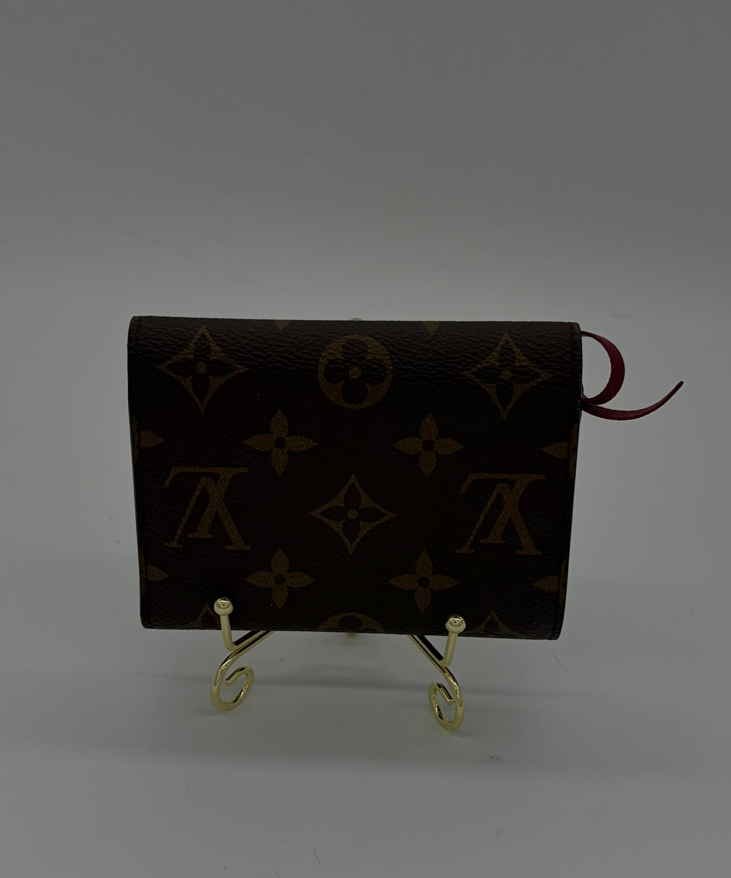 LOUIS VUITTON Excellent: This item is gently used Wallet