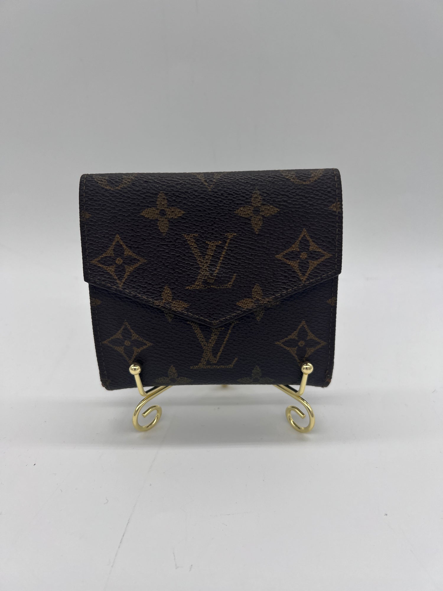 LOUIS VUITTON Fair / Well-Loved: Item shows wear Wallet